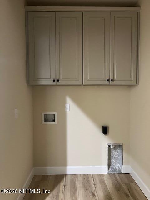 669 South Orange Street Starke, FL 32091 - Photo 3 of 12 a view of storage and utility room with wooden floor