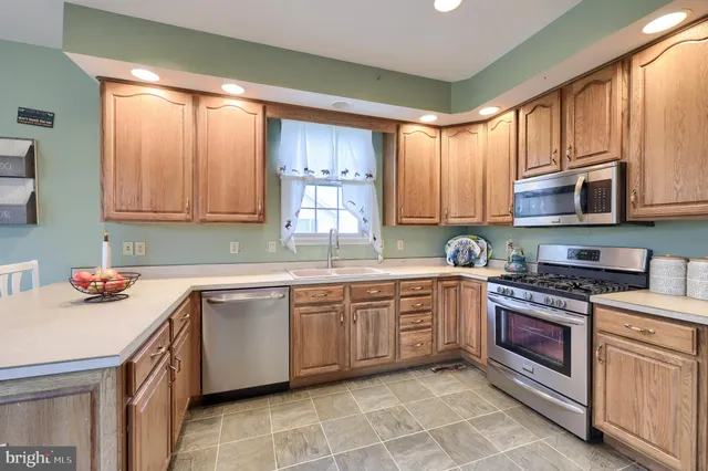 a living room with furniture or fireplace and a large window