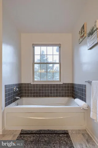 a bedroom with a bed and a cabinets