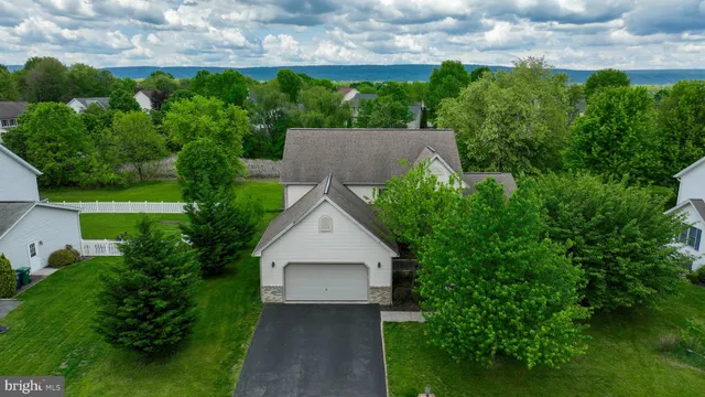 a view of a house with a big yard