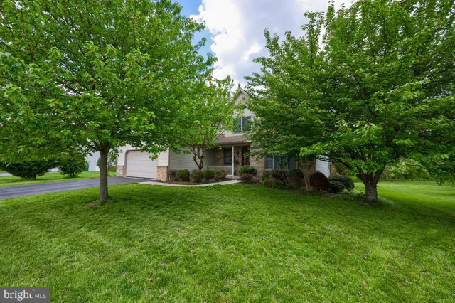 a view of a golf course with a garden
