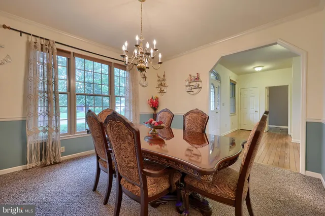 a kitchen with stainless steel appliances granite countertop a stove sink microwave and cabinets