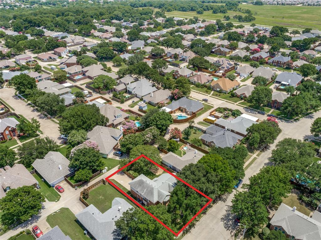 1215 Spring Creek Drive Allen, TX 75002 - Photo 36 of 40 Aerial perspective showcasing a residential neighborhood with mature trees