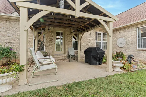 a view of a porch with seating space