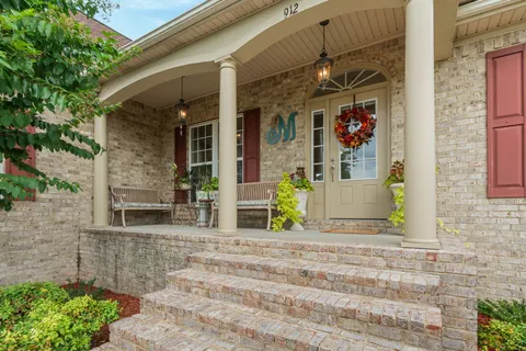 a front view of a building with an outdoor space