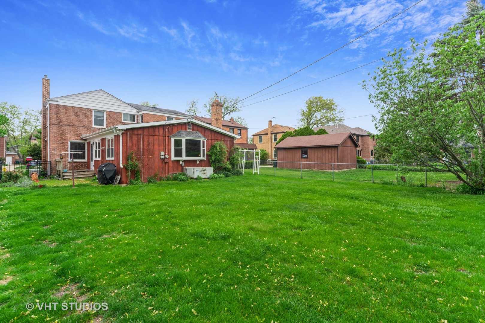 505 Warren Avenue Park Ridge, IL 60068 - Photo 16 of 21 a front view of a house with garden
