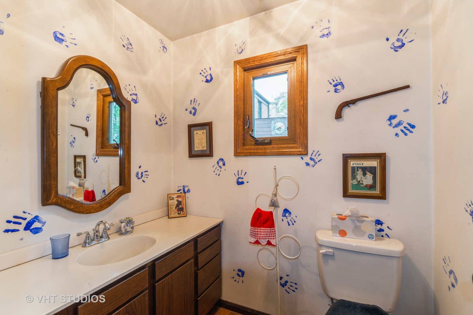 505 Warren Avenue Park Ridge, IL 60068 - Photo 9 of 21 a bathroom with a sink mirror and vanity