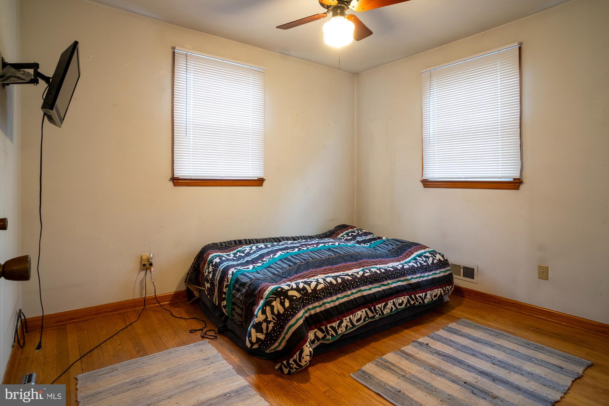 1200 Oakland Terrace Road Baltimore, MD 21227 - Photo 15 of 21 Cozy bedroom with natural light and charm.