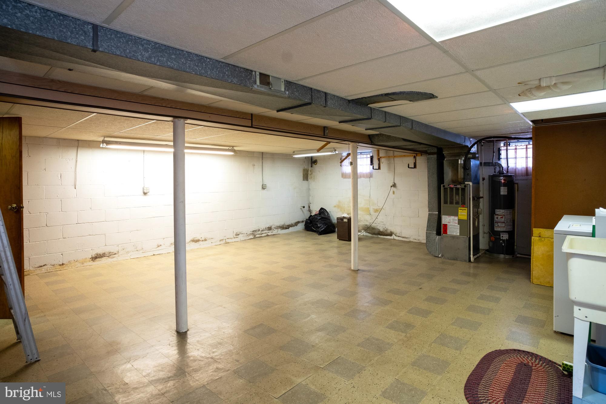 1200 Oakland Terrace Road Baltimore, MD 21227 - Photo 7 of 21 Spacious basement ready for transformation.