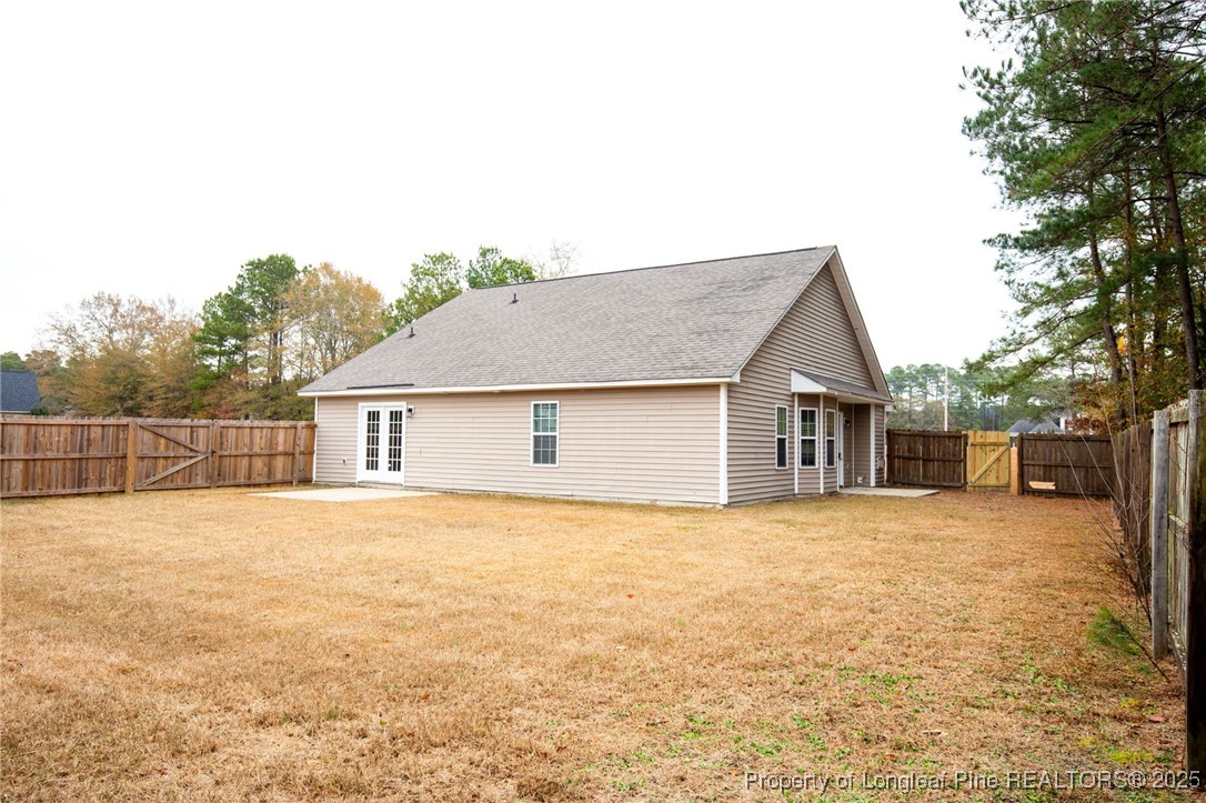 3192 Braddy Road Fayetteville, NC 28306 - Photo 20 of 20 a view of a house with a yard