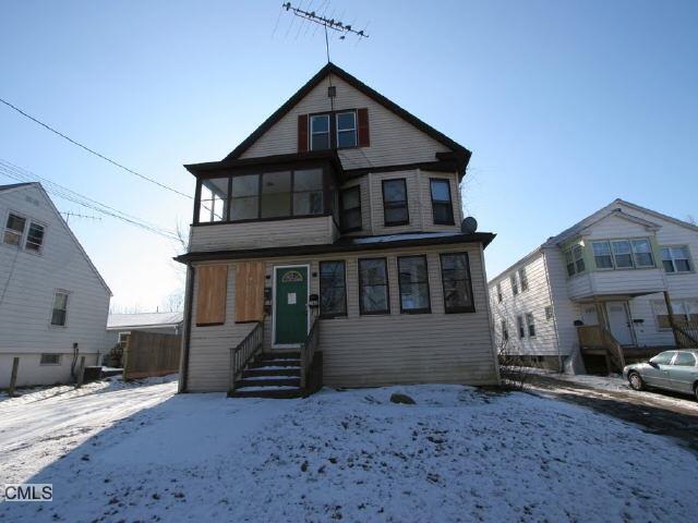 361 Canaan Road Stratford, CT 06614 - Photo 1 of 1 a front view of a house with a yard