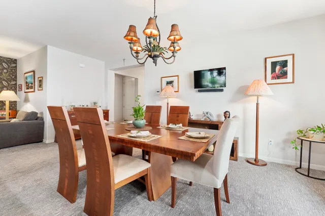 a view of a dining room with furniture