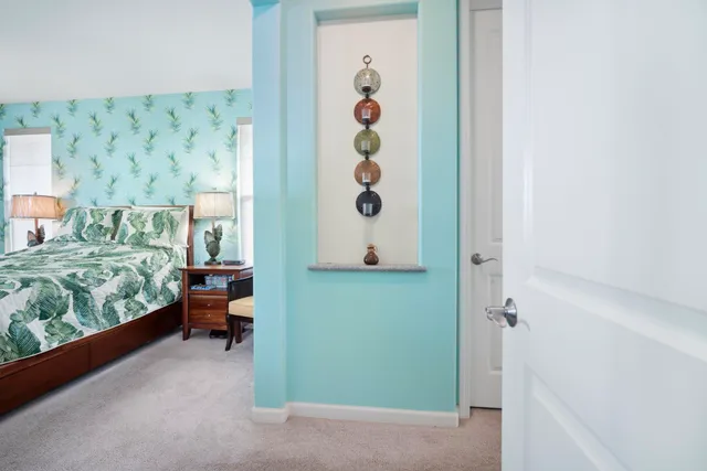 a view of room with window and lounge chair