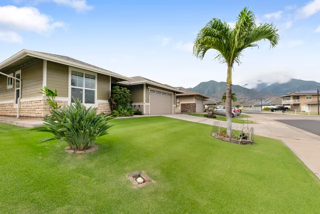 a house view with a garden space
