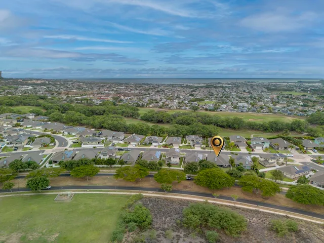 an aerial view of a city with lots of residential buildings