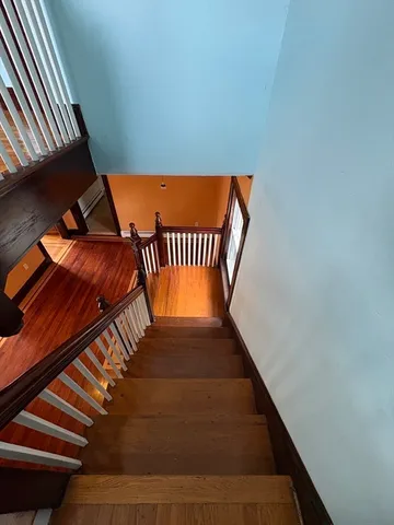 a view of balcony with wooden floor