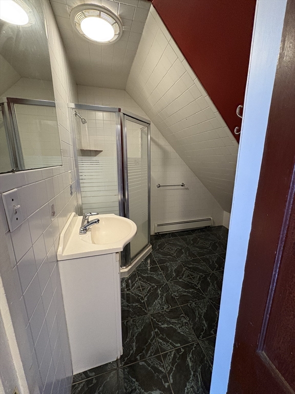 547 Talbot Avenue Boston, MA 02124 - Photo 14 of 14 a bathroom with a sink and mirror