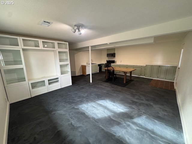 911 Division La Grande, OR 97850 - Photo 15 of 39 a view of a livingroom with furniture and a window