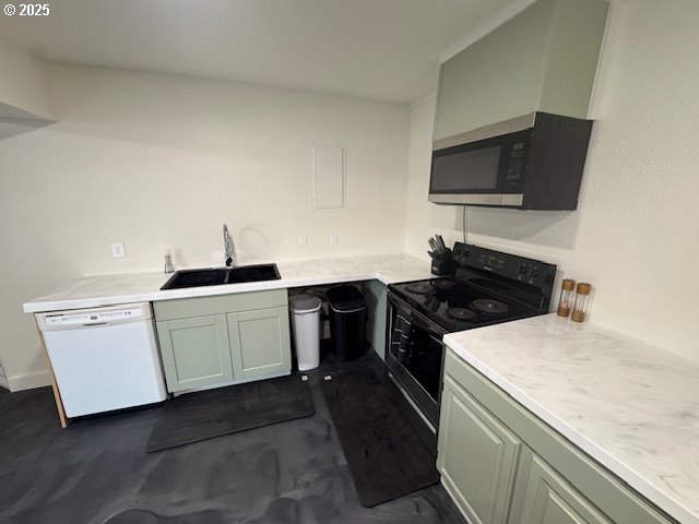 911 Division La Grande, OR 97850 - Photo 18 of 39 a kitchen with a sink and a stove top oven