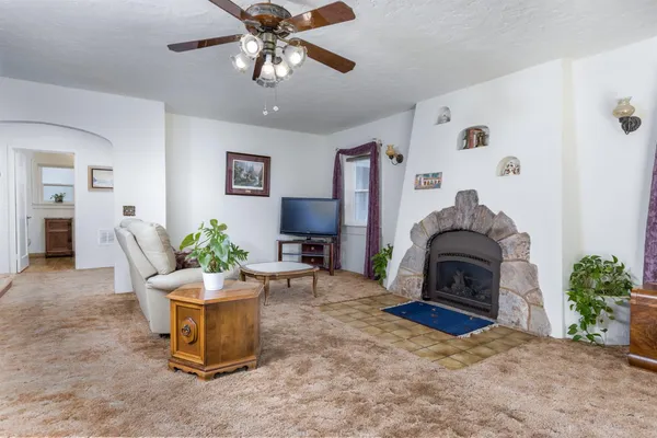 a view interior of a house with wooden floor and a rug