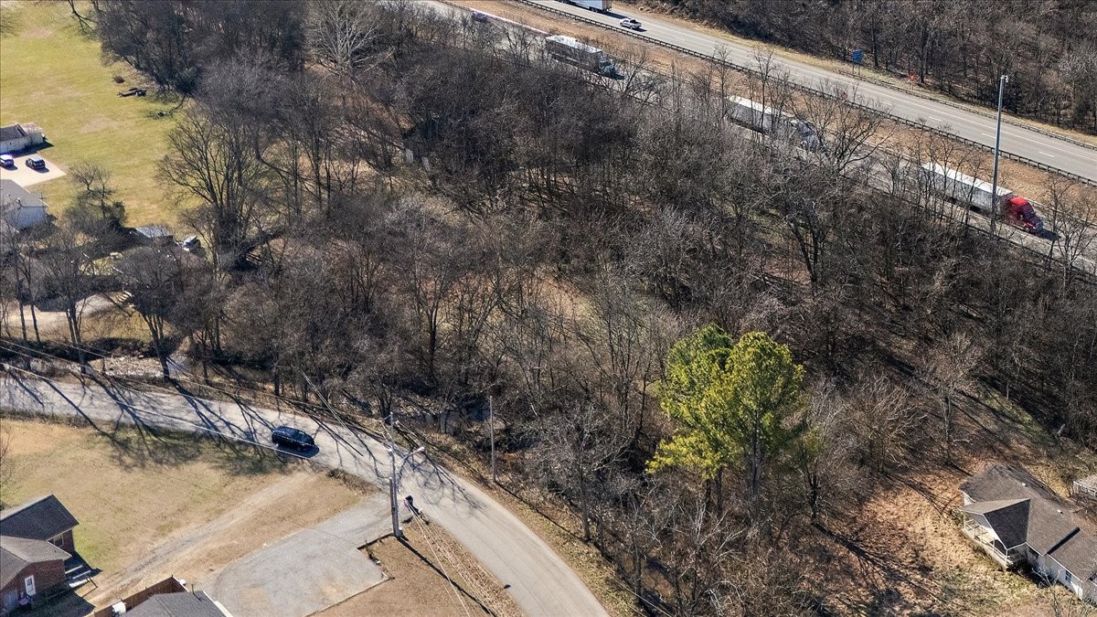 1105 Slaters Creek Road Goodlettsville, TN 37072 - Photo 5 of 5 a view of a yard with wooden fence