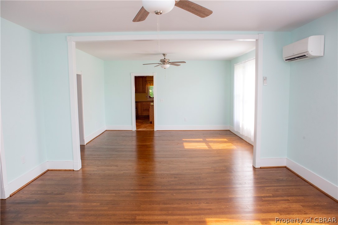 8669 Guinea Road Hayes, VA 23072 - Photo 20 of 49 Living & Dining Rooms with Hardwood Flooring