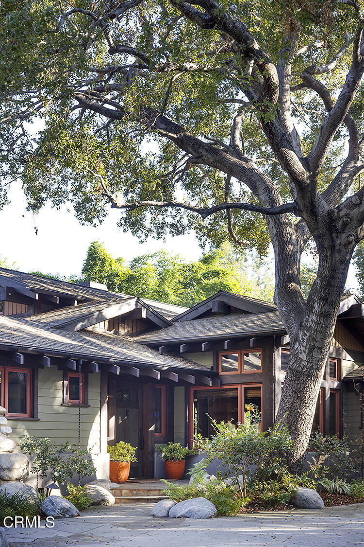 1260 La Loma Road Pasadena, CA 91105 - Photo 14 of 61 a front view of a house with a yard and outdoor seating