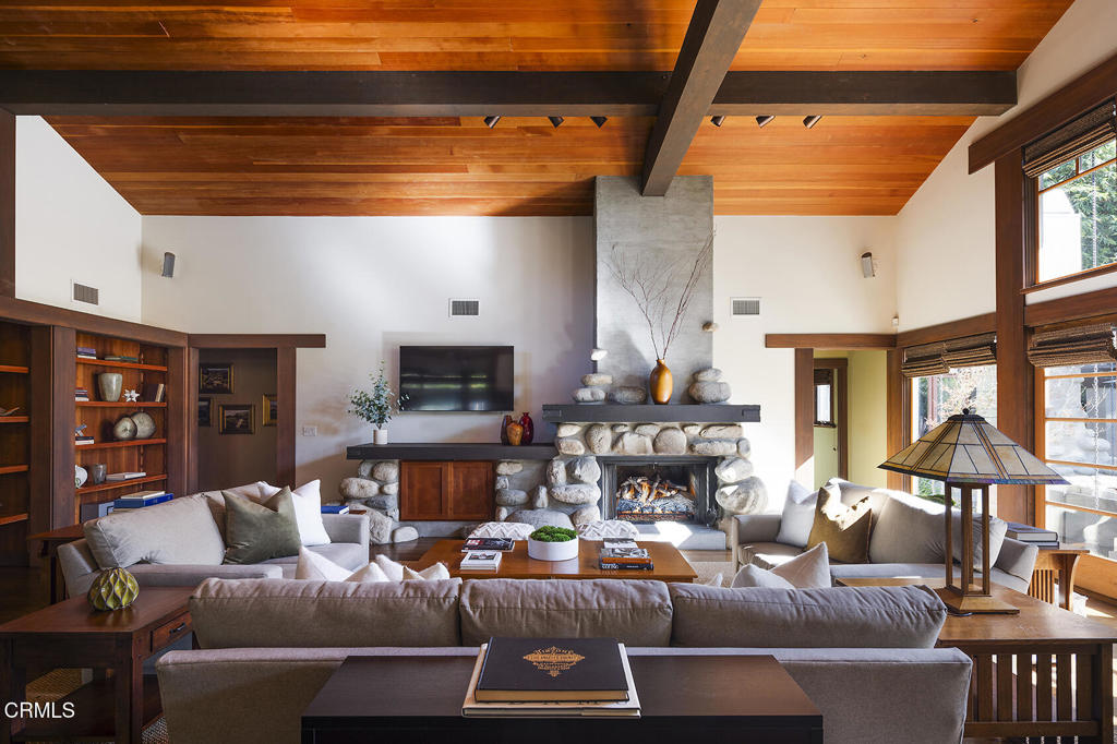 1260 La Loma Road Pasadena, CA 91105 - Photo 16 of 61 a living room with furniture and a fireplace