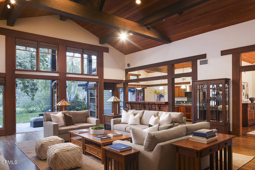 1260 La Loma Road Pasadena, CA 91105 - Photo 19 of 61 a living room with furniture tv and a large window