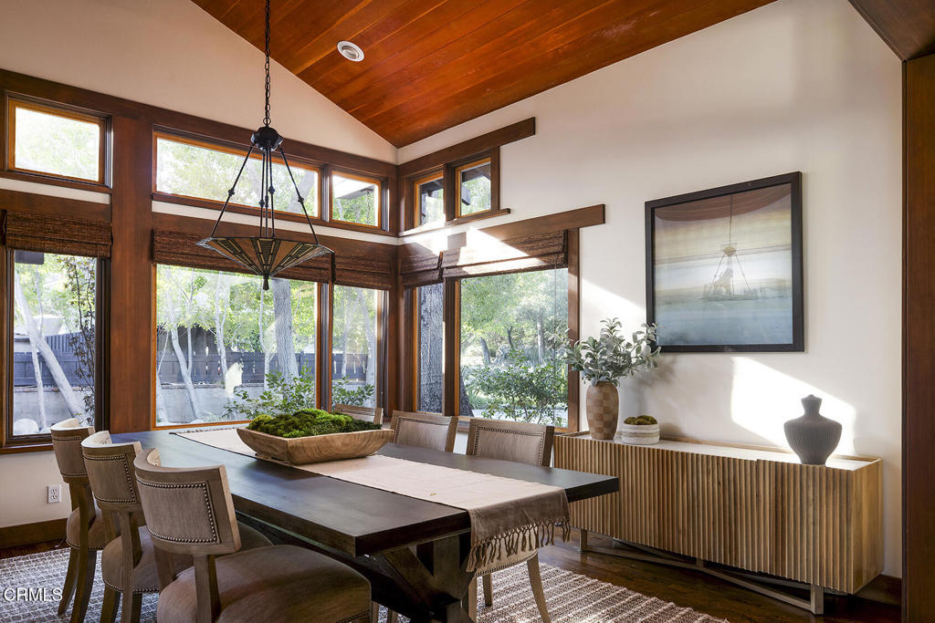 1260 La Loma Road Pasadena, CA 91105 - Photo 22 of 61 a living room with furniture and a large window