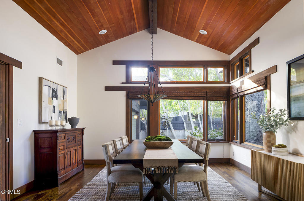 1260 La Loma Road Pasadena, CA 91105 - Photo 23 of 61 a dining room with furniture window and wooden floor