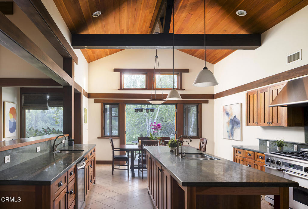 1260 La Loma Road Pasadena, CA 91105 - Photo 26 of 61 a kitchen with stainless steel appliances granite countertop a sink and a large window