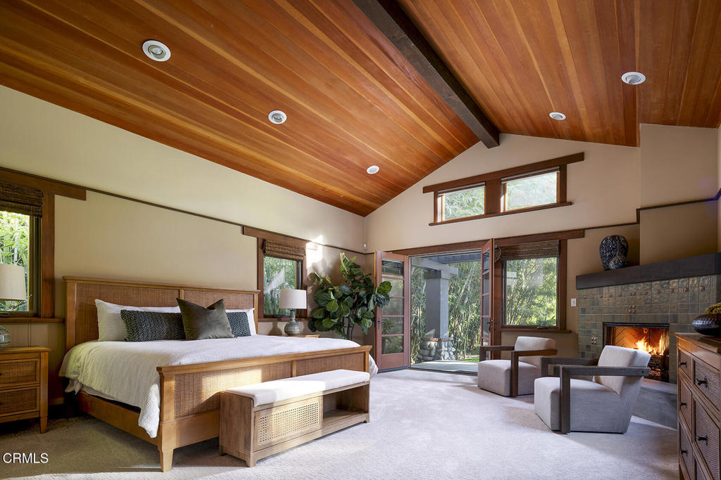 1260 La Loma Road Pasadena, CA 91105 - Photo 32 of 61 a bed room with a bed and a fireplace