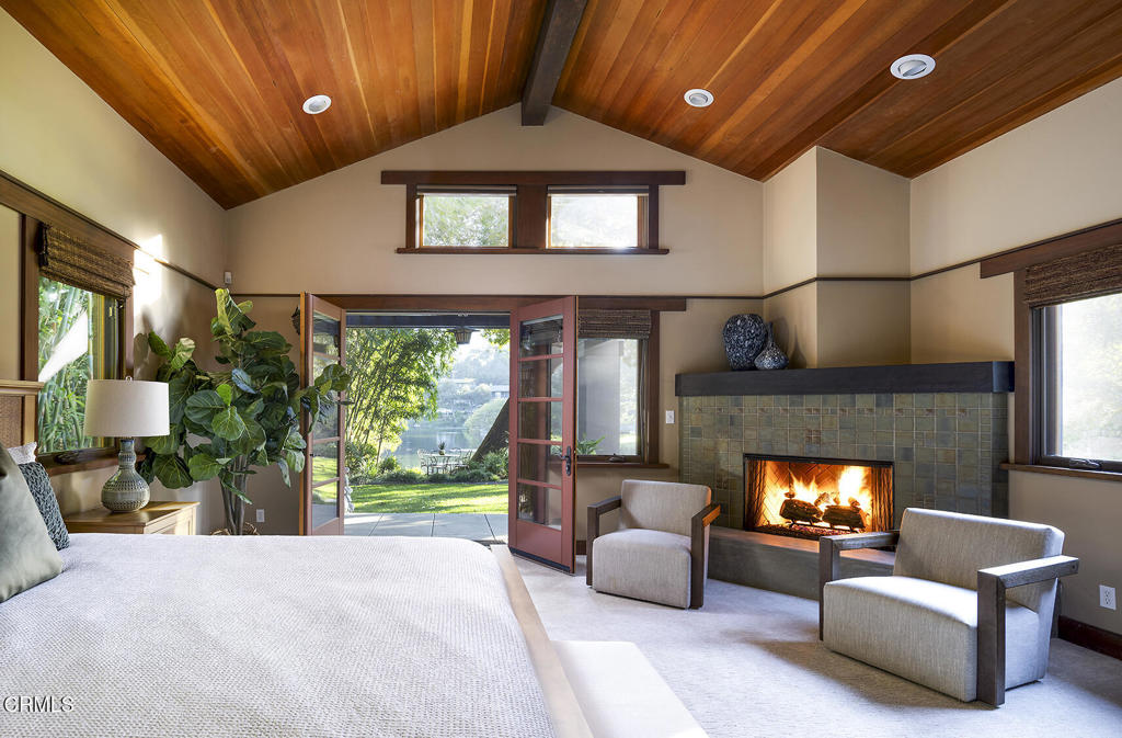 1260 La Loma Road Pasadena, CA 91105 - Photo 33 of 61 a living room with furniture and a fireplace