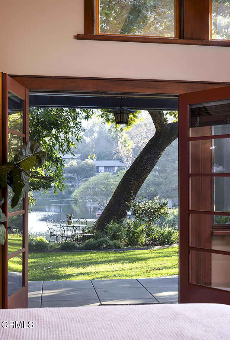1260 La Loma Road Pasadena, CA 91105 - Photo 34 of 61 a front view of a house with a yard and potted plant