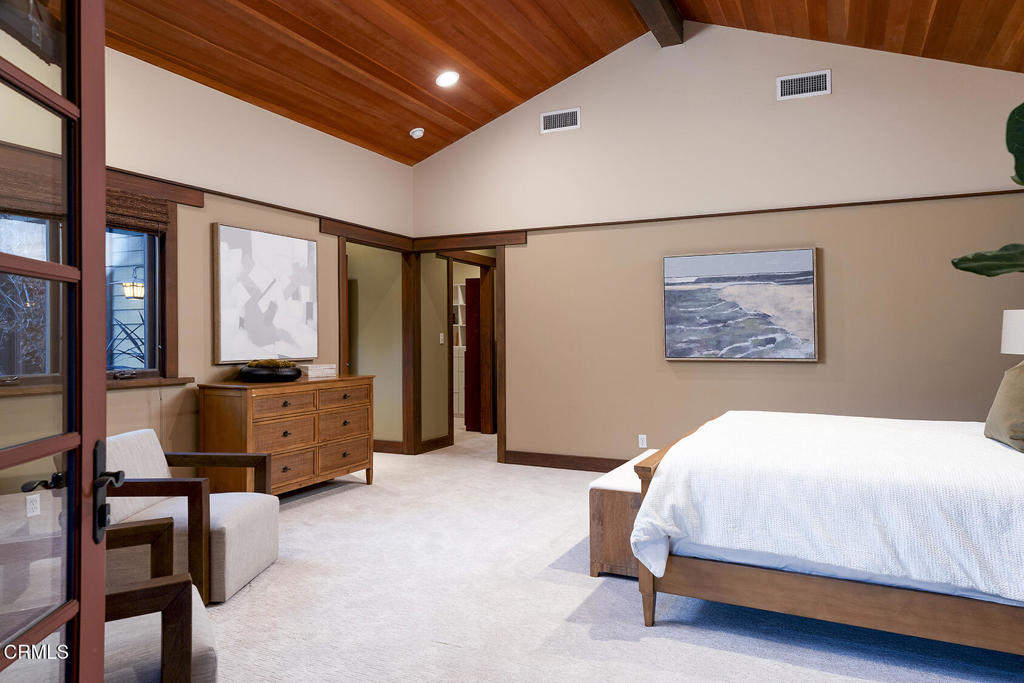 1260 La Loma Road Pasadena, CA 91105 - Photo 36 of 61 a bedroom with a bed and large windows