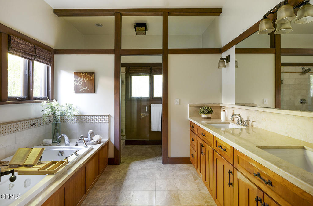 1260 La Loma Road Pasadena, CA 91105 - Photo 38 of 61 a large bathroom with a granite countertop double vanity sink a mirror and a bathtub