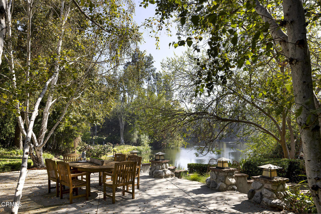 1260 La Loma Road Pasadena, CA 91105 - Photo 43 of 61 a view of backyard with table and chairs and potted plants