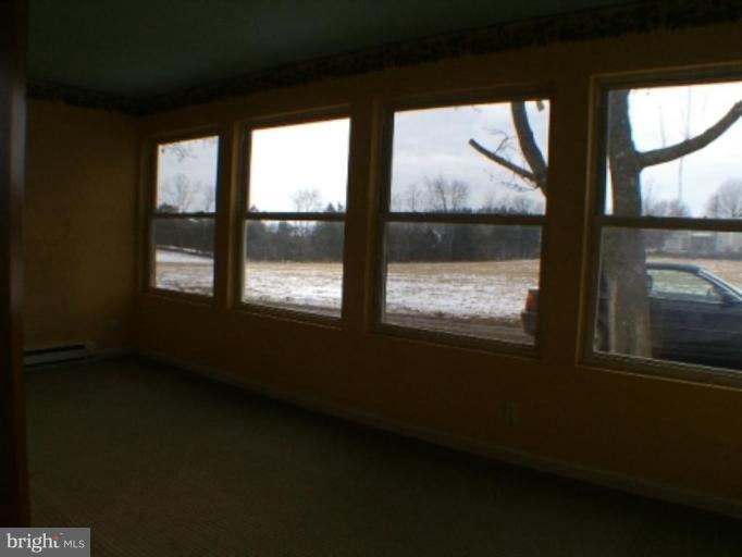 3738 Rittenour Road Woodstock, VA 22664 - Photo 19 of 30 a view of an empty room with a window