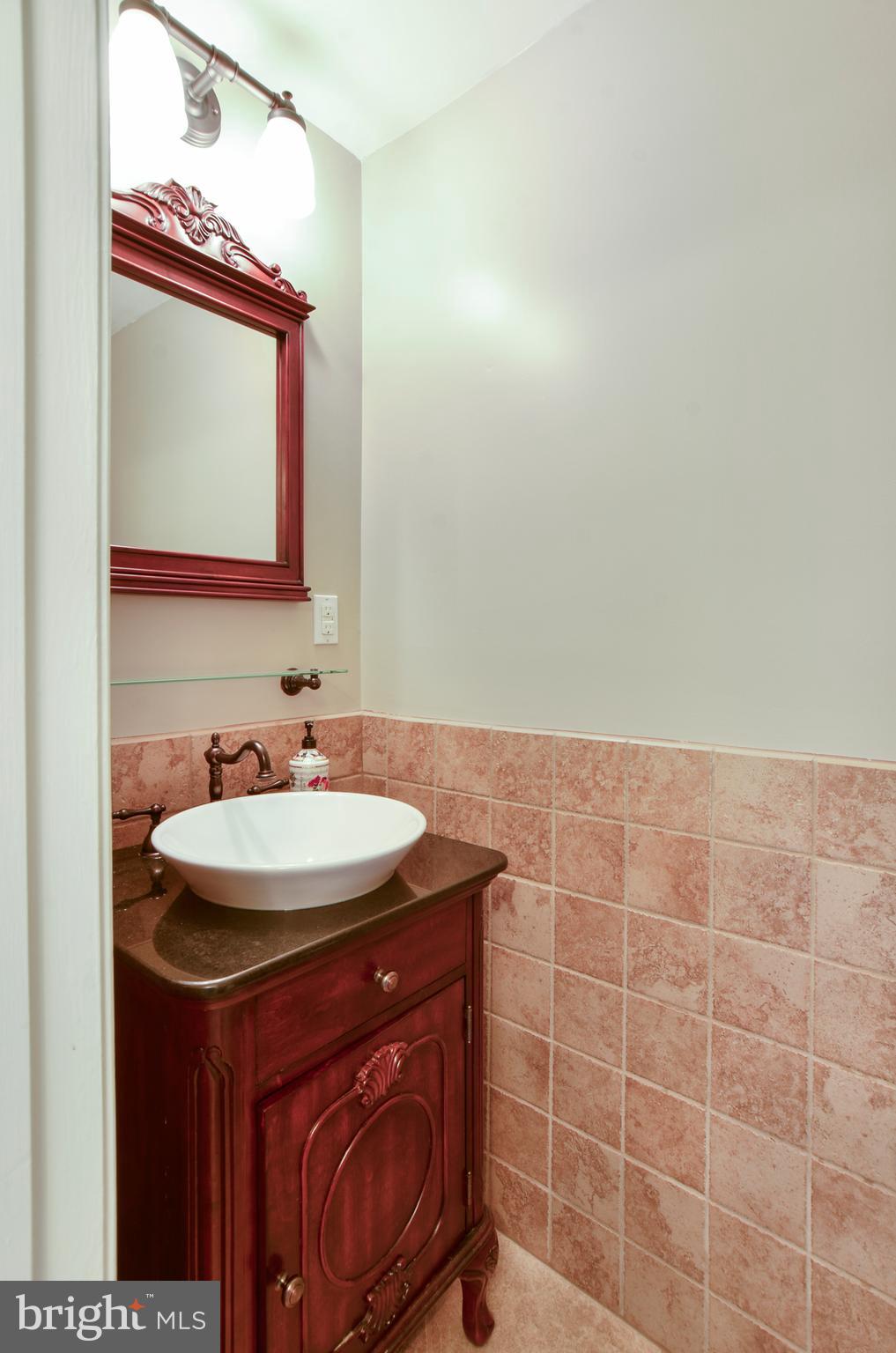 8496 Stonewall Road Manassas, VA 20110 - Photo 12 of 26 First floor half bath