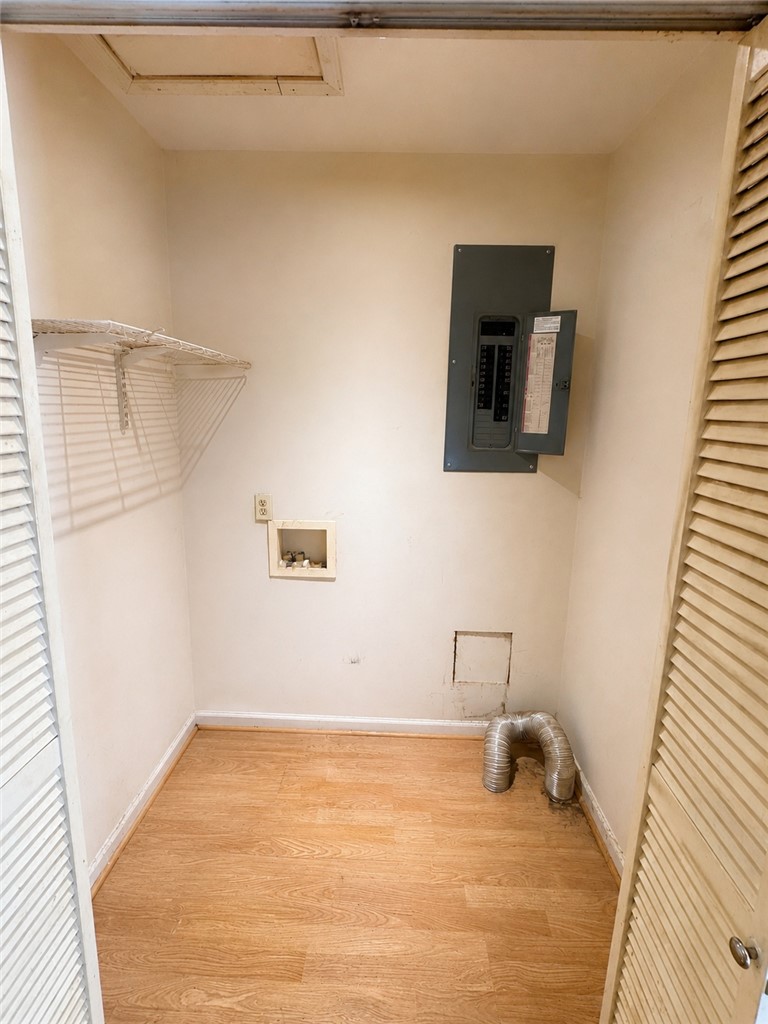 138 Cloverdale Road Seneca, SC 29678 - Photo 8 of 27 Ready for your washer and dryer, this dedicated utility area features convenient connections and shelving.