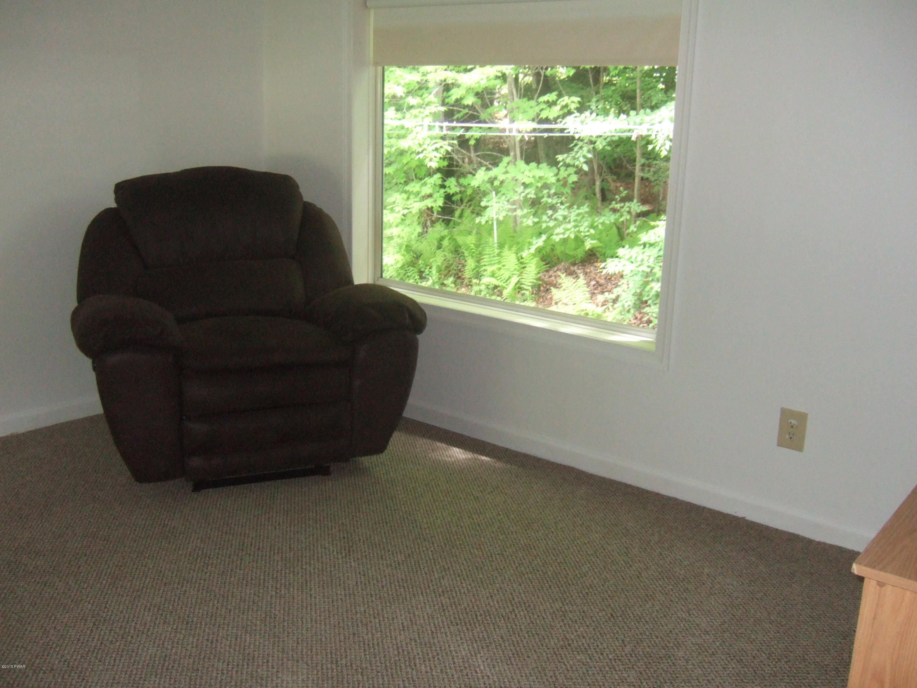 479 Roemerville Road Greentown, PA 18426 - Photo 2 of 30 a living room with furniture and a window