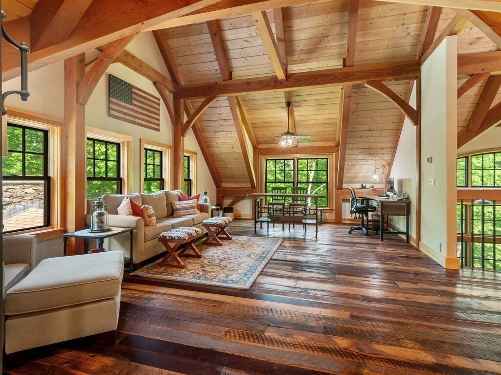 51 Sterling Road Princeton, MA 01541 - Photo 29 of 42 a living room with furniture and a large window