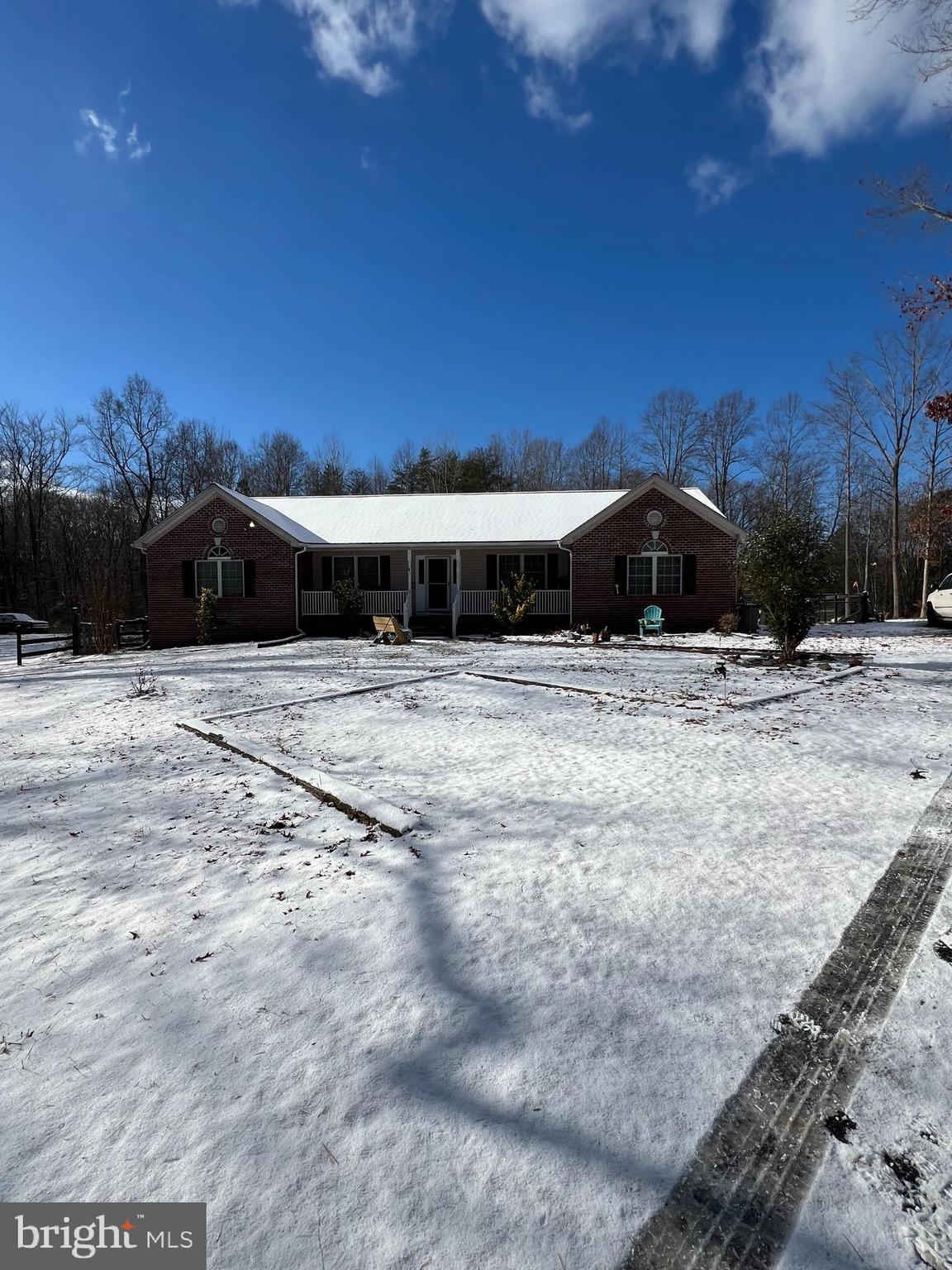 10358 Tower Road Unionville, VA 22567 - Photo 1 of 7 a view of large space with a house in the background