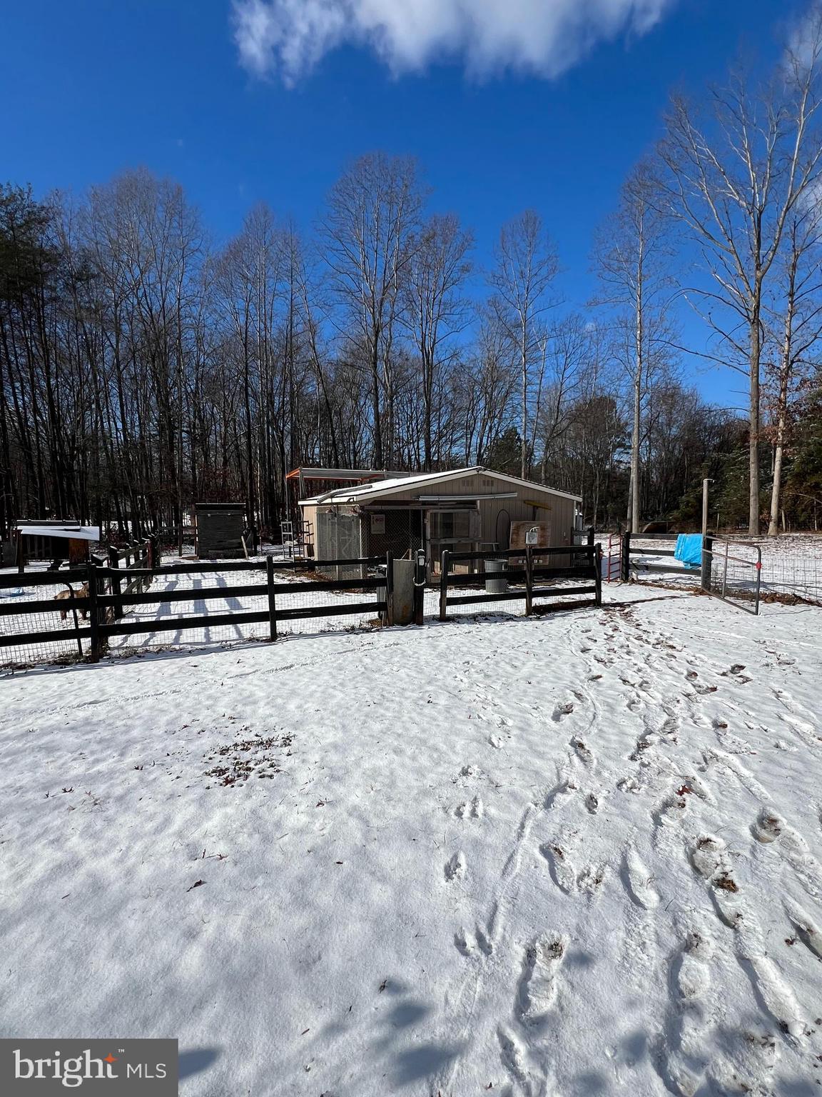 10358 Tower Road Unionville, VA 22567 - Photo 2 of 7 a view of outdoor space with lots of car parked