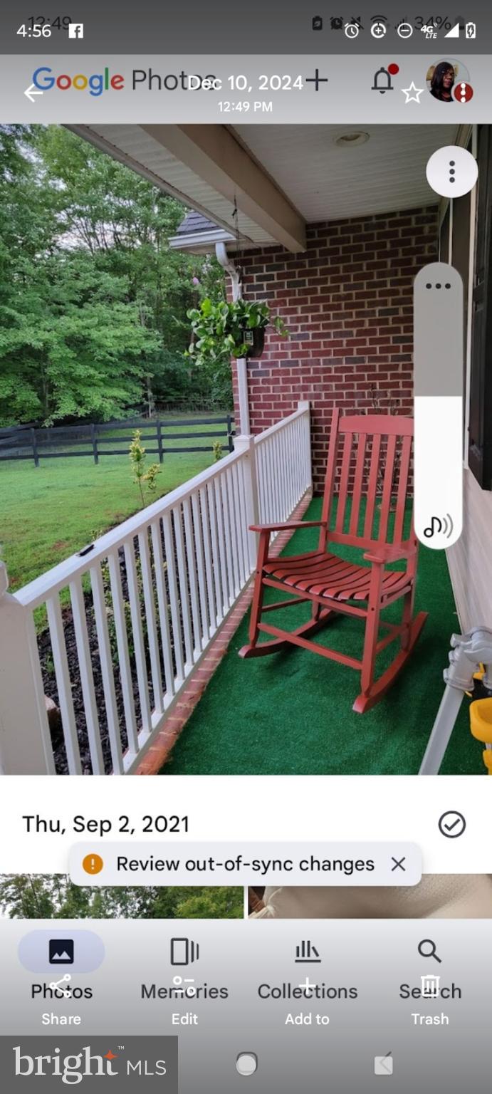 10358 Tower Road Unionville, VA 22567 - Photo 5 of 7 a view of a bench in back yard