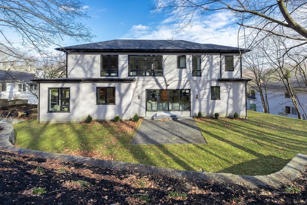 28 Cottonwood Road Newton, MA 02459 - Photo 25 of 25 a view of a house with a yard