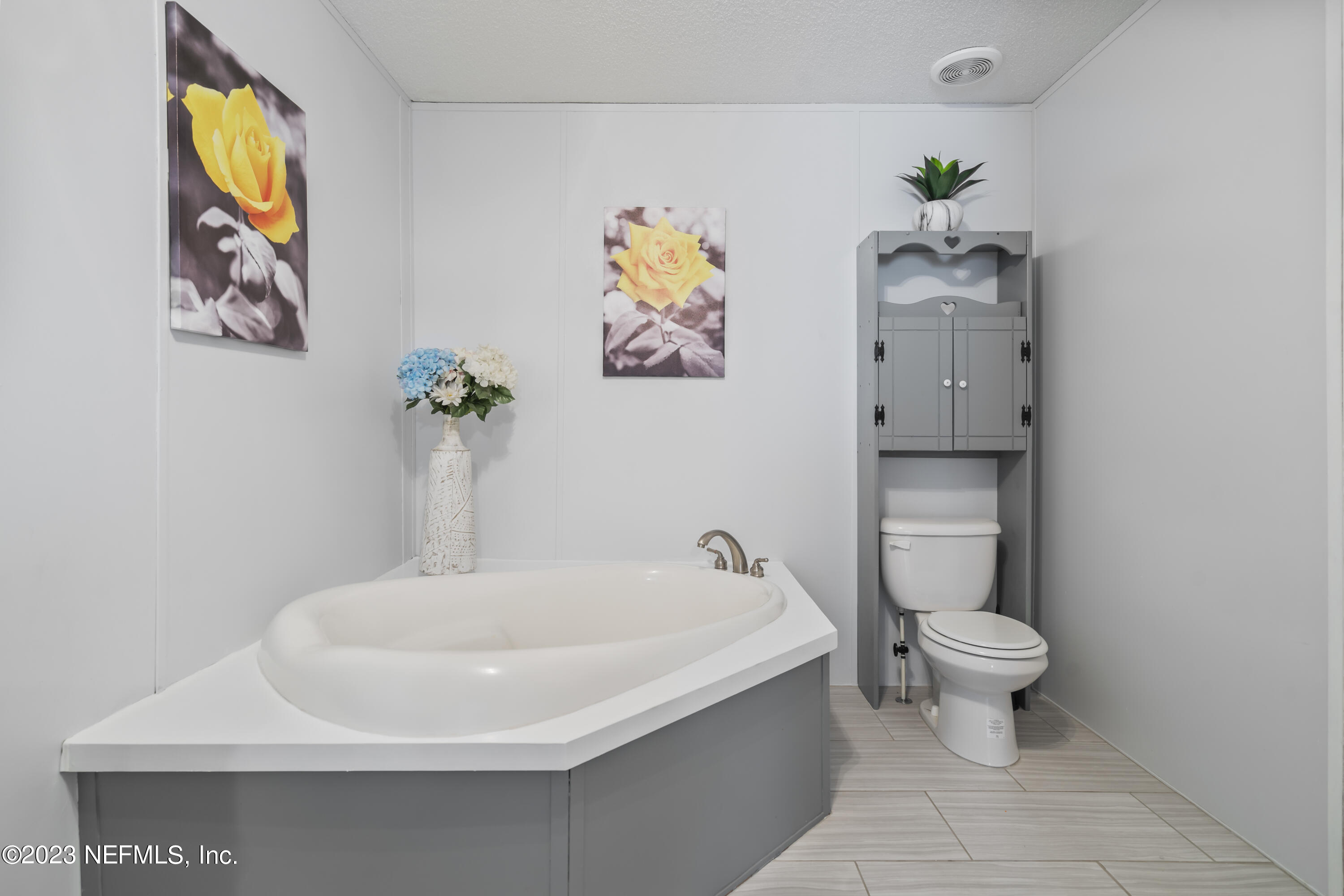 198 Yellow Water Road Baldwin, FL 32234 - Photo 25 of 37 a bathroom with a sink and a toilet
