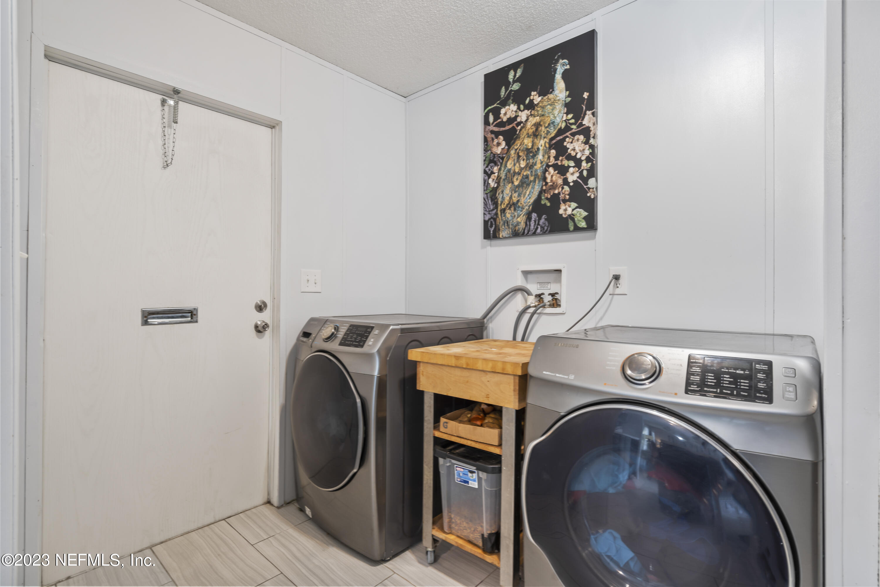 198 Yellow Water Road Baldwin, FL 32234 - Photo 27 of 37 a utility room with dryer and washer