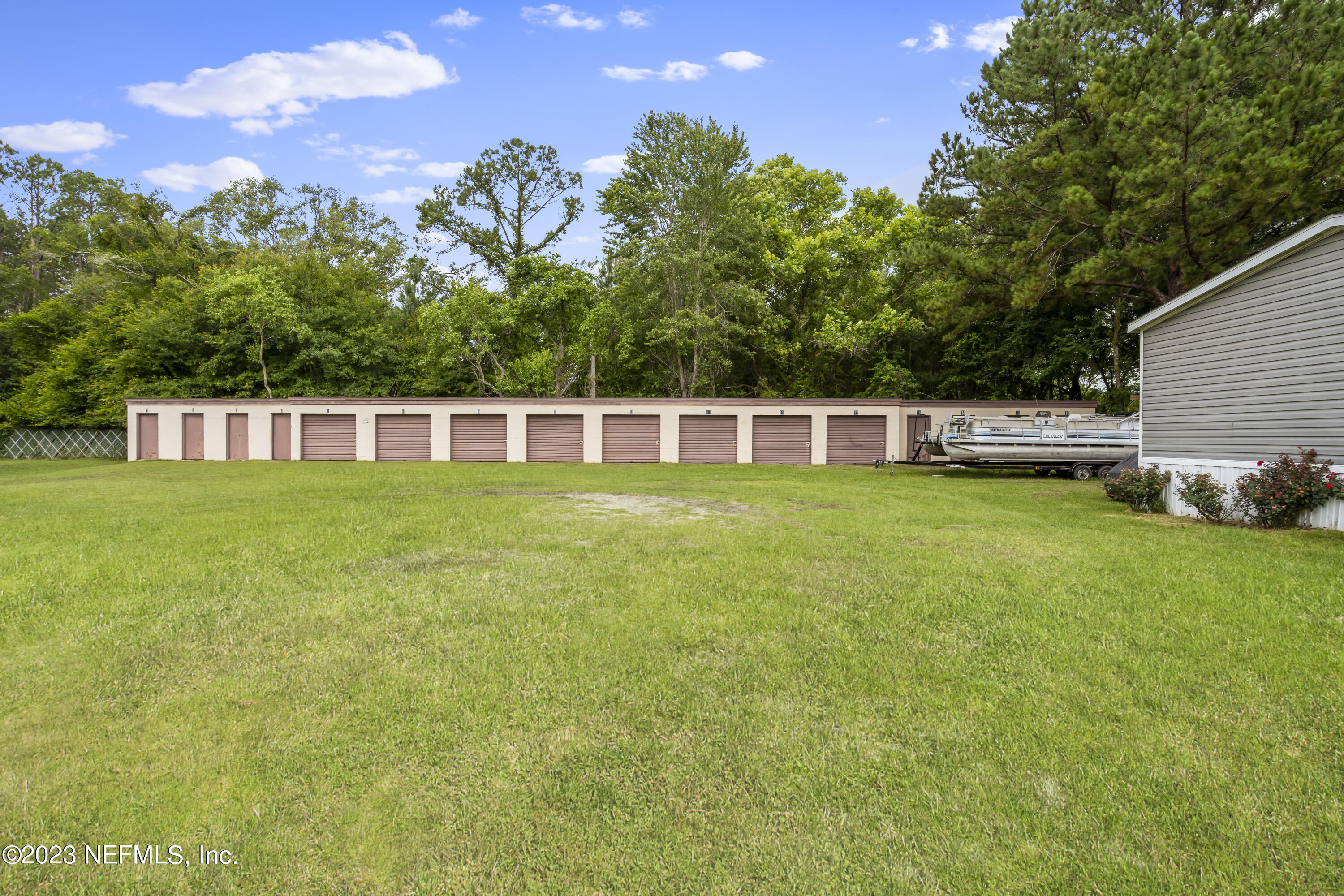 198 Yellow Water Road Baldwin, FL 32234 - Photo 29 of 37 a view of a house with a yard